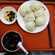 Owners of a restaurant in Beijing said Xi ordered a meal similar to this one of steamed buns, liver and vegetables last month.